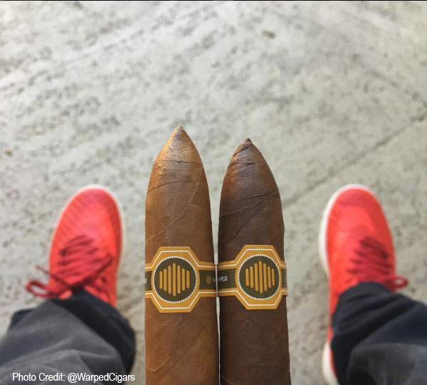Where to Buy Warped Black Honey - SmallBatchCigar.com Picture of La Colmena and Black Honey side by side